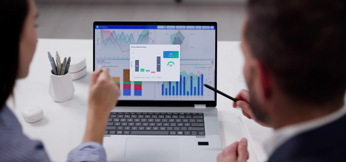 people looking at laptop statistics for dental seo strategy