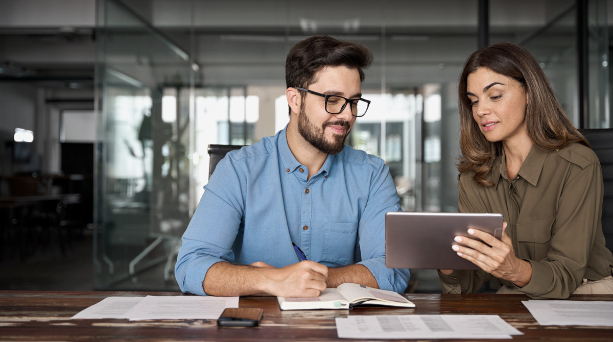 man and woman working together skills for Protect Your Job From AI Automation